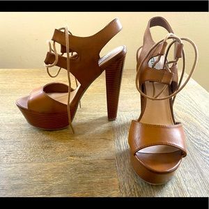 Steve Madden brown platform wood chunky heels.